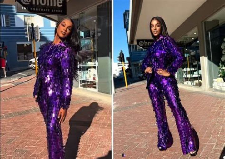Posing up a storm: The 22-year-old model, who is the daughter of actor Jude Law and fashion designer Sadie Frost, enjoyed an ice cream in a strapped cream vest top and baggy shorts